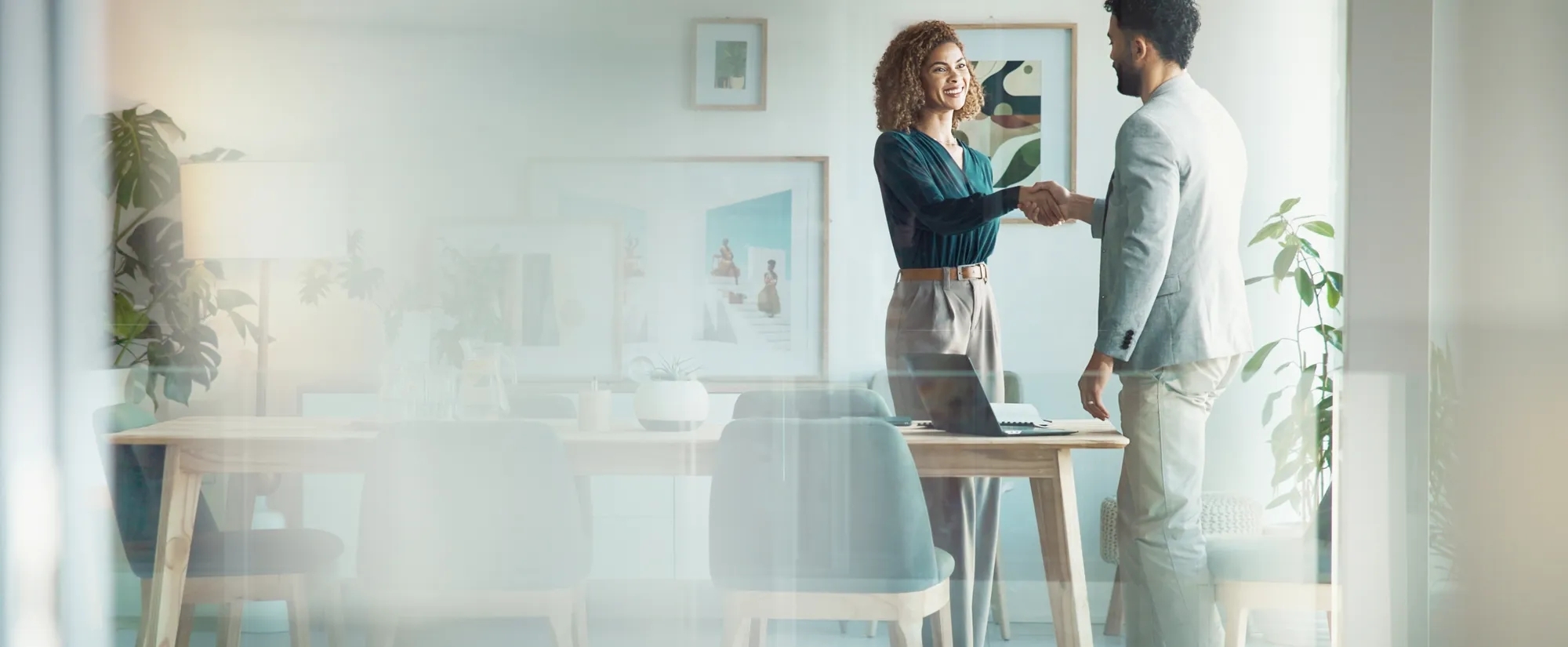 Man and woman shaking hands